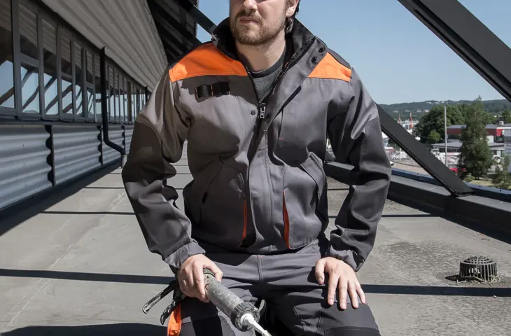 A man wearing an Epishock bomber jacket